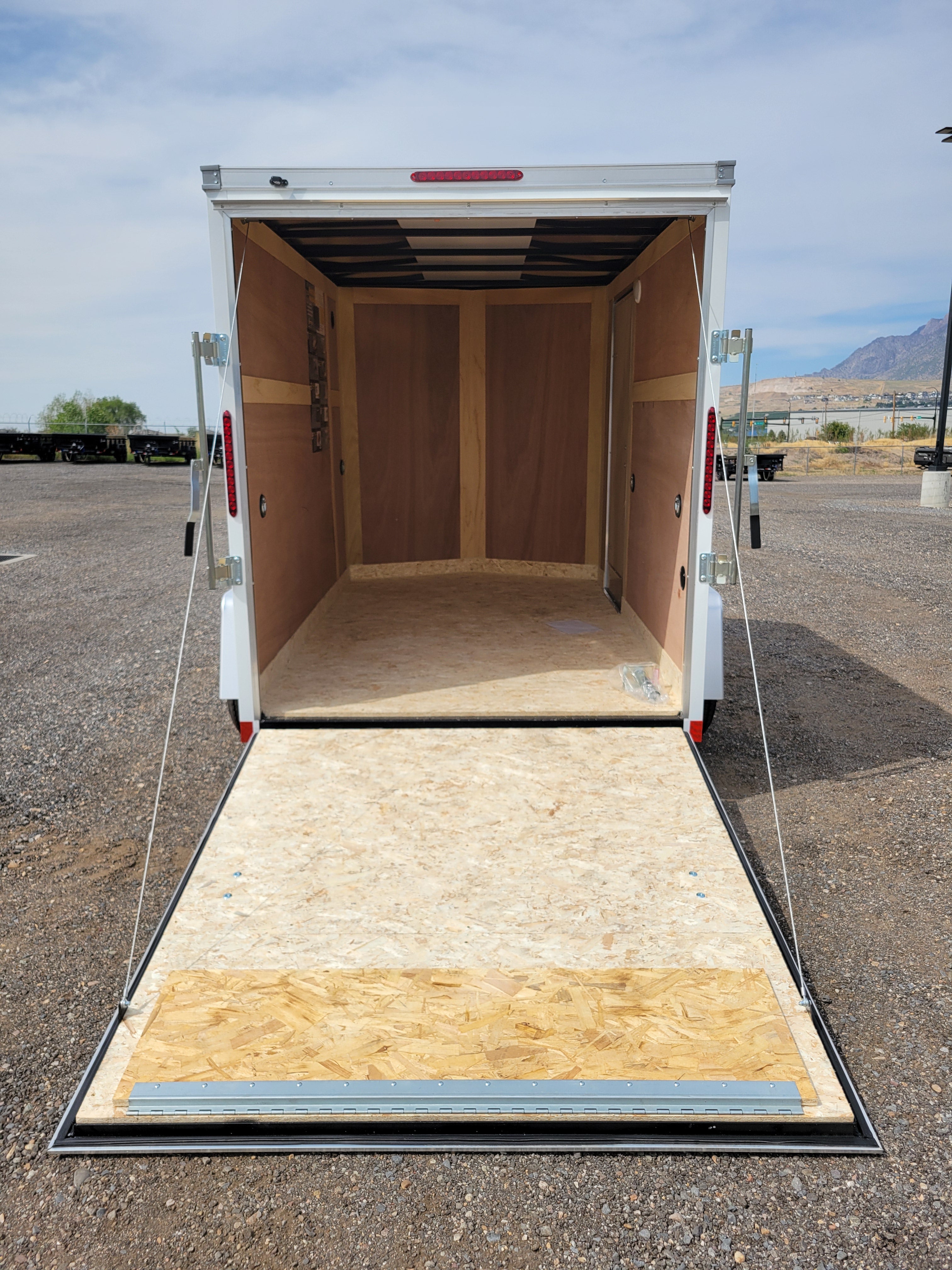 Wells Cargo 6 x 10 Deluxe Enclosed Trailer
