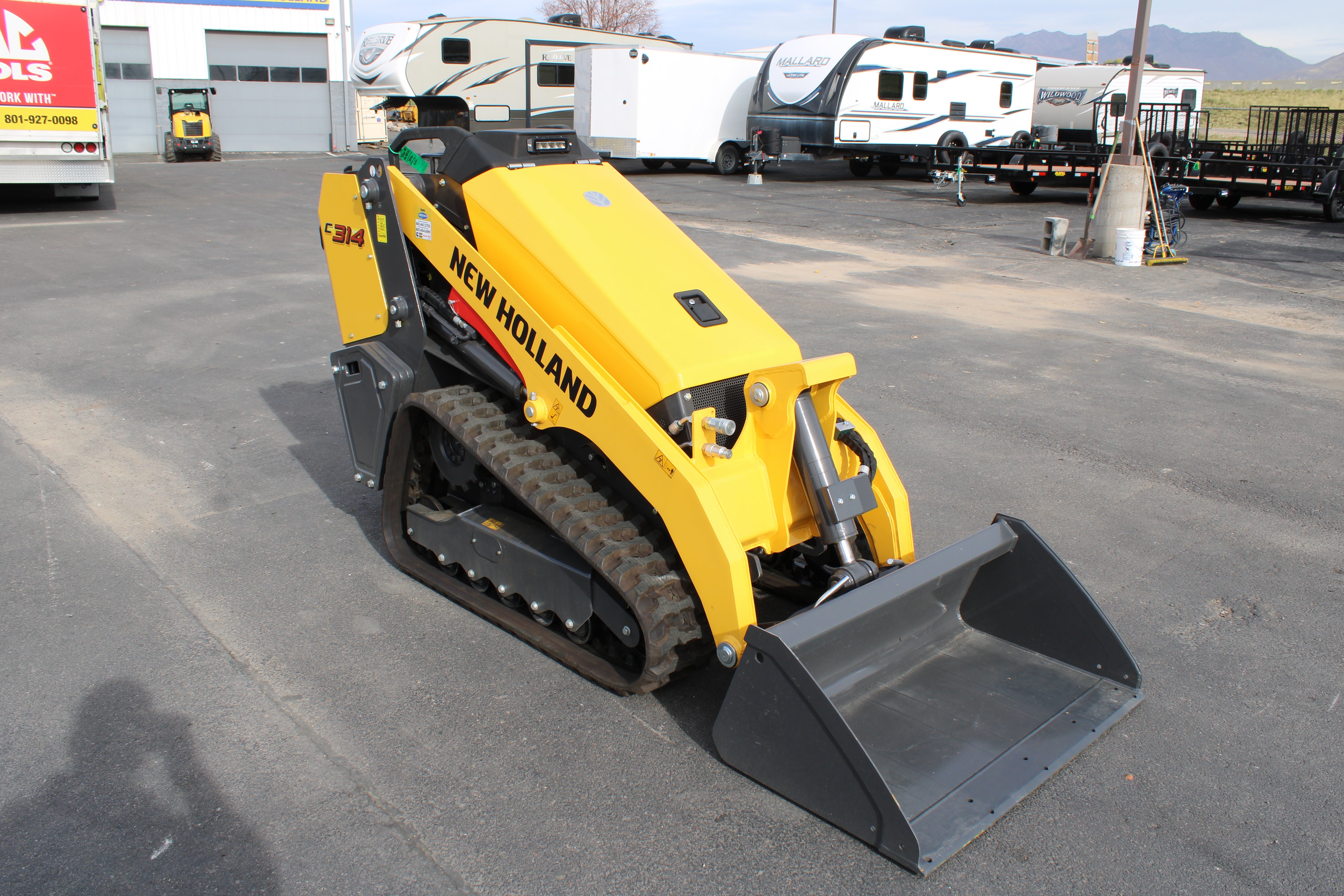 New Holland C314 Mini Skidsteer