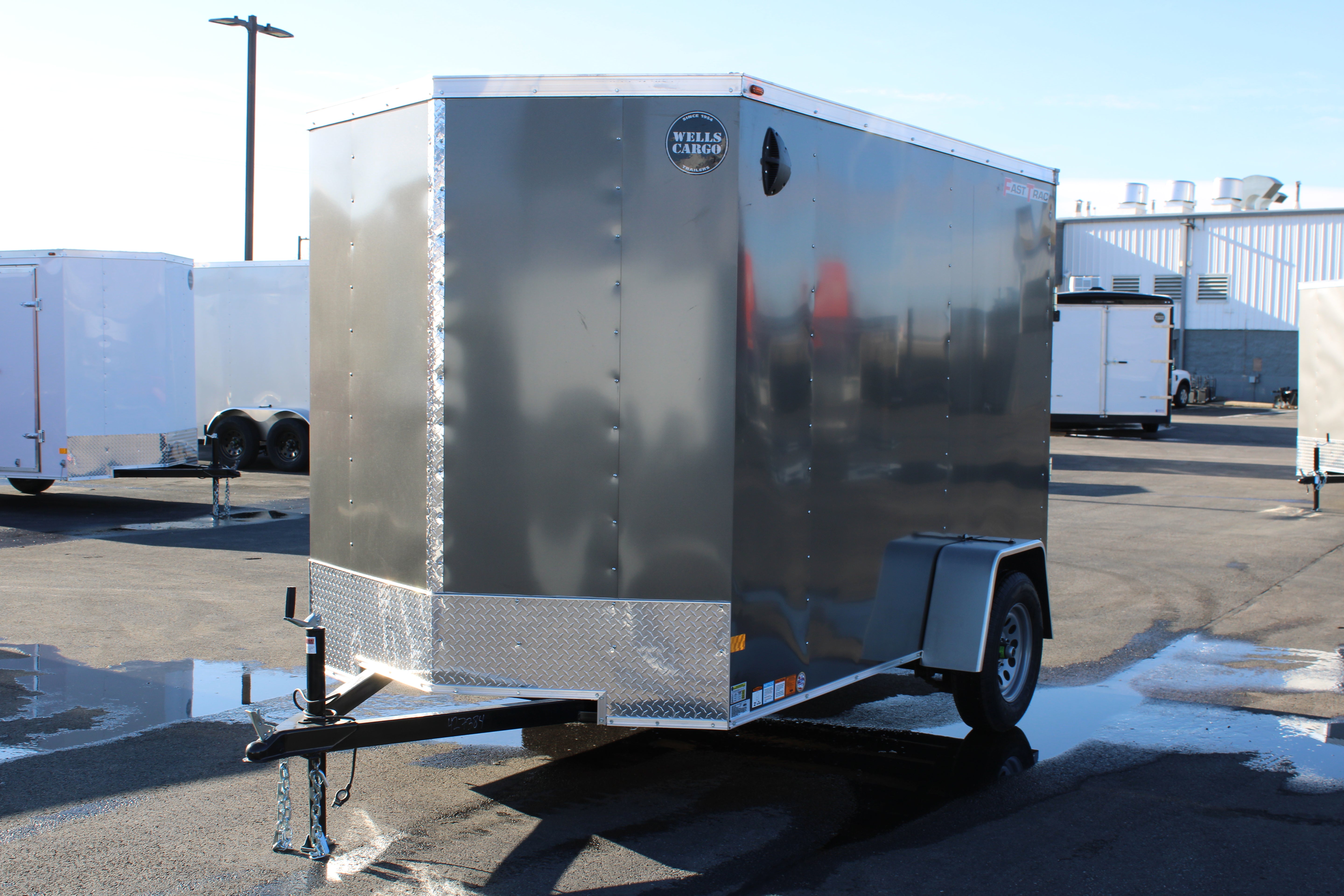 2025 Wells Cargo 6 x 10 Deluxe Enclosed Trailer