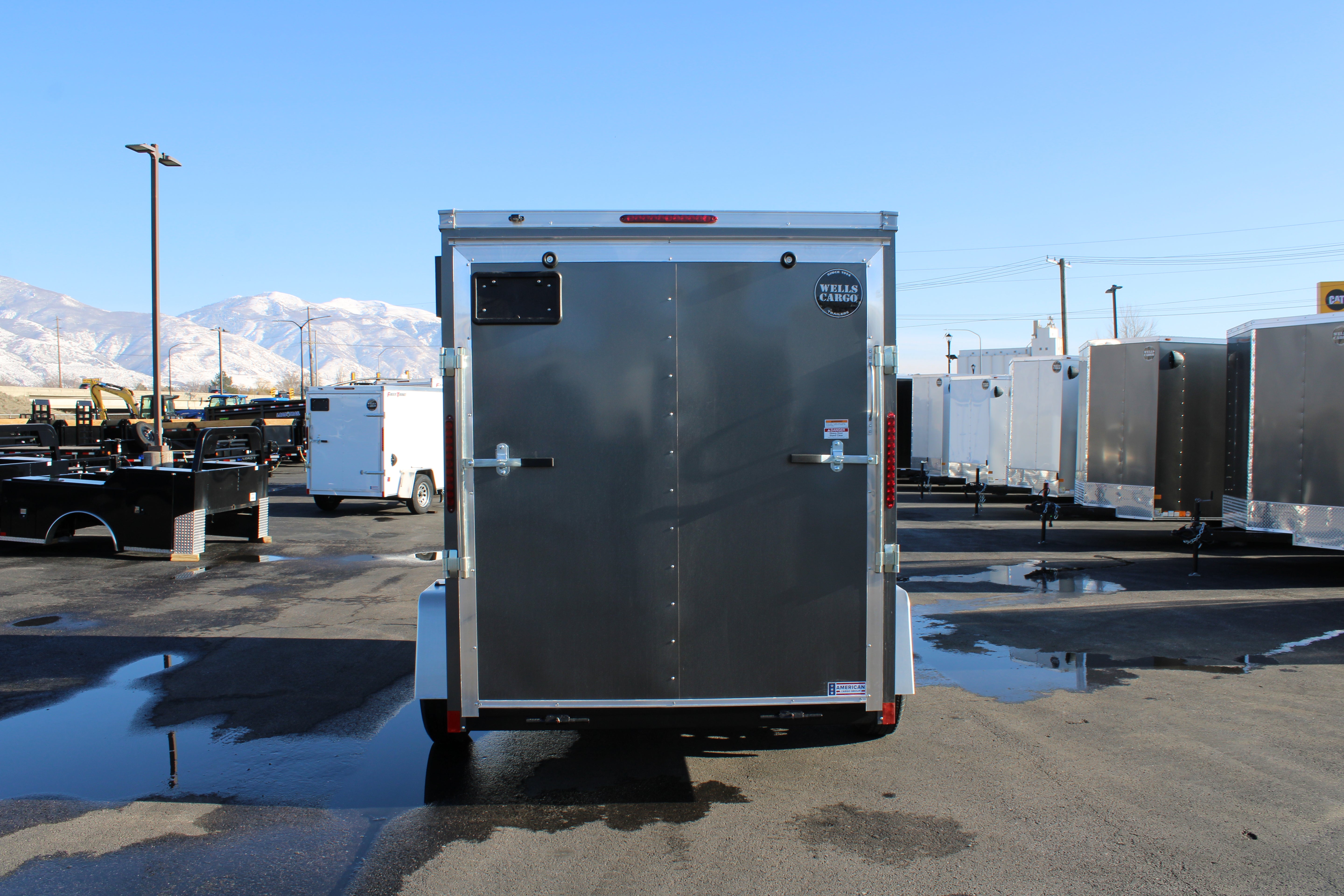 2025 Wells Cargo 6 x 10 Deluxe Enclosed Trailer