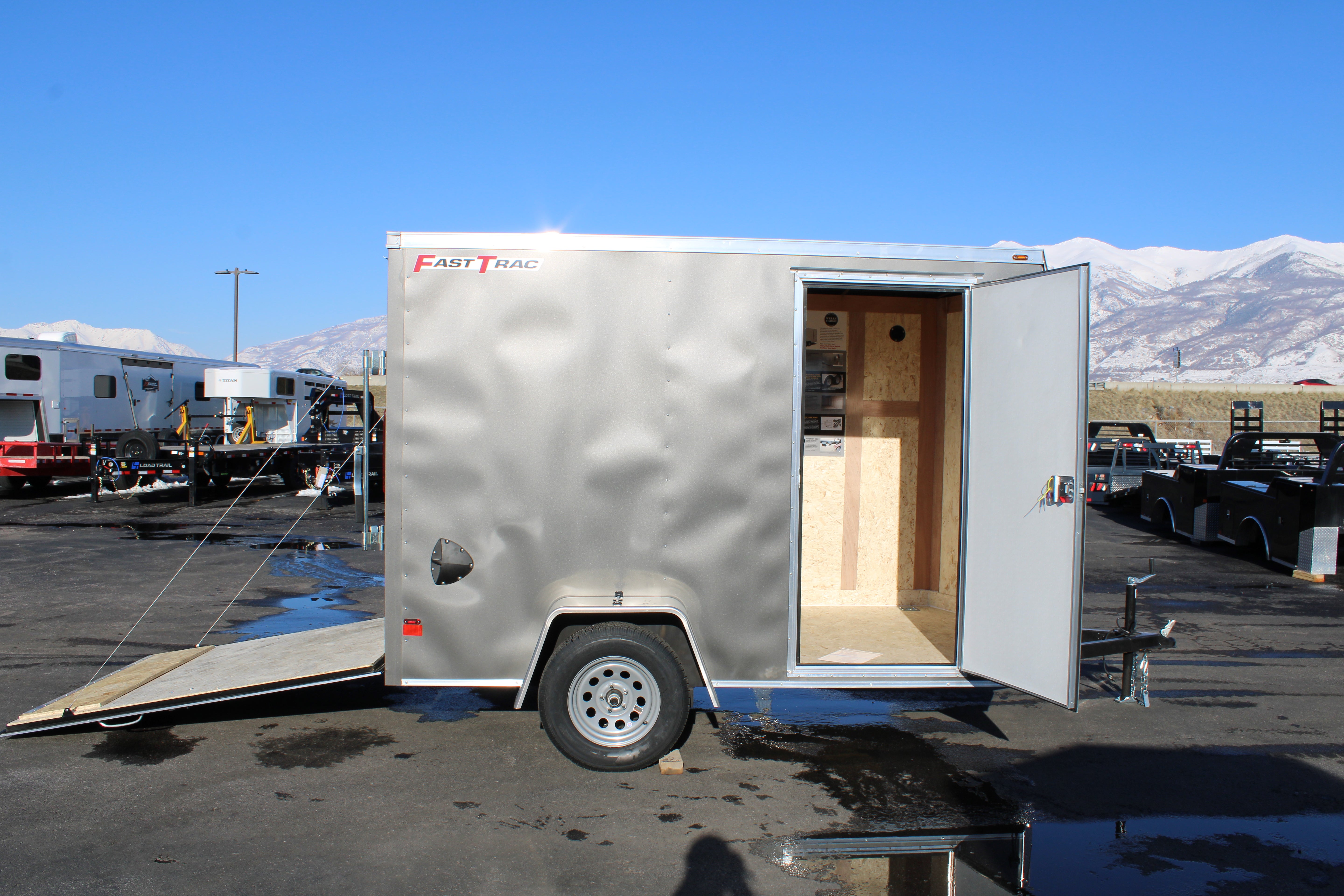 2025 Wells Cargo 6 x 10 Deluxe Enclosed Trailer